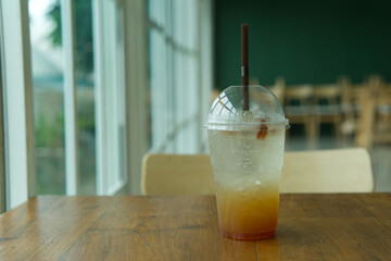 Iced lemon-infused honey on the table in the cafe