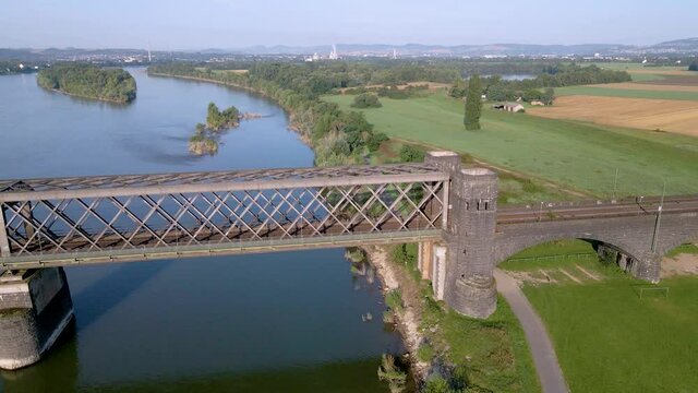 Flyover a stone train track on the banks of Rhine river in Germany close to Koblenz