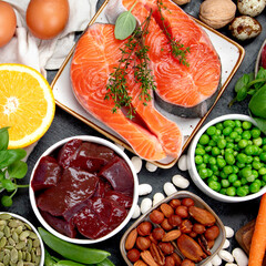 Food high in vitamin B3 on dark background.