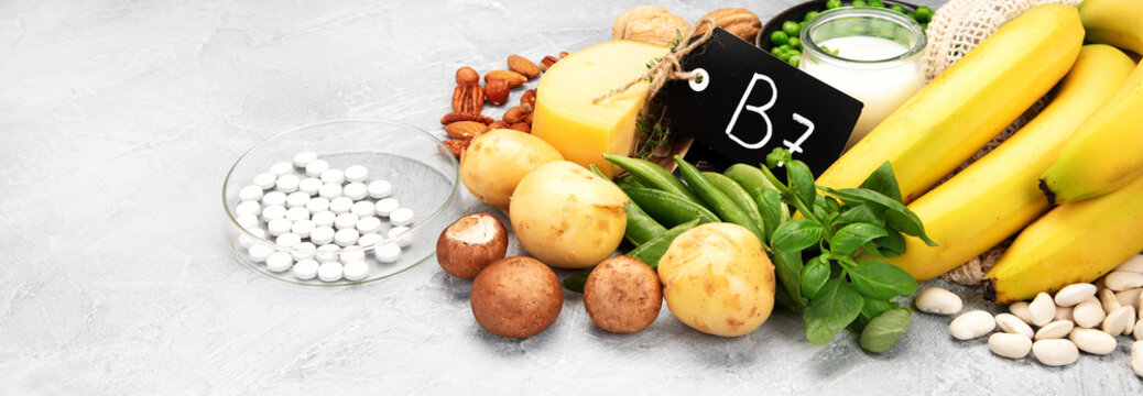 Food high in vitamin B7 on dark background.