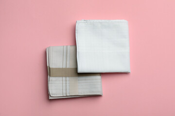 Stylish handkerchiefs on pink background, flat lay