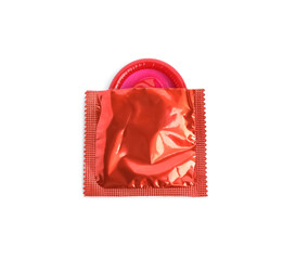 Unpacked red condom isolated on white, top view. Safe sex
