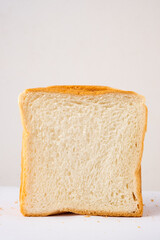 Slice of bread on the white background.
