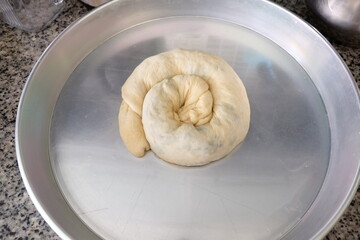 Process of making a traditional Turkish dough is called 