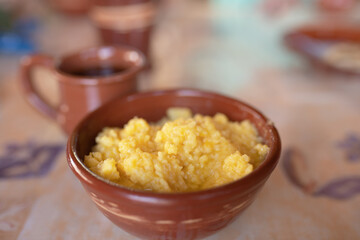 Pumpkin millet porridge in a bowl on the table