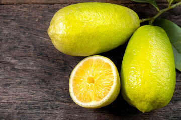 Fresh lemon on an old wooden table.