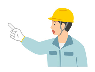 指差し確認をする作業着の若い男性