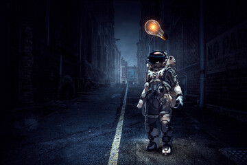 Fototapeta premium Astronaut walking on an unexplored planet