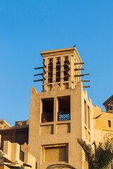 Fototapeta na wymiar Traditional Arabic cooling wind tower. Ancient