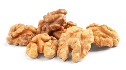 Pile of peeled walnuts on white background
