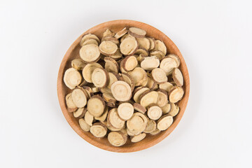 Chinese herbal medicine, sliced of dry Licorice isolated on white background