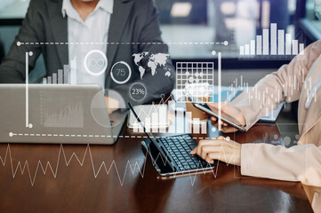 Intelligence (BI) and business analytics with key performance indicators dashboard concept. Two business colleague web designer discussing data