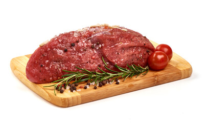 Fresh beef meat with spices, isolated on white background.