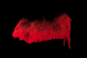 Explosion of colored powder on black background