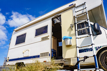 Caravan with ladder. Camper equipment.