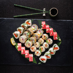 sushi on the black background