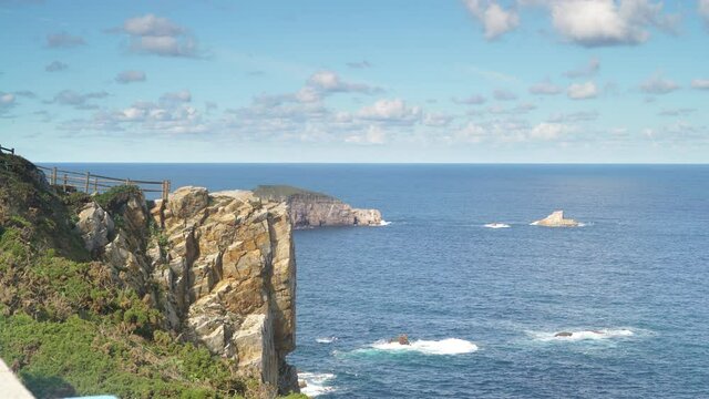 Seascape of Atlantic ocean and Asturias rocky coast at Cape Penas. Sea shore with high cliffs in north Spain.