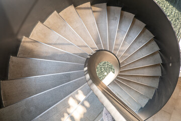 Bangkok, Thailand - May 15, 2020 : Upside view of a spiral staircase pattern. Spiral stairs circle...