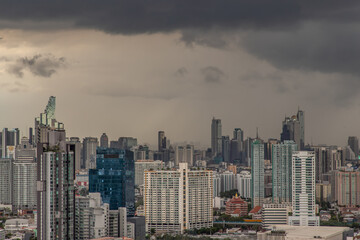 Fototapeta na wymiar Bangkok, thailand - May 28, 2020 : Sky view of Bangkok with skyscrapers in the business district in Bangkok in the evening beautiful twilight give the city a modern style. Selective focus.