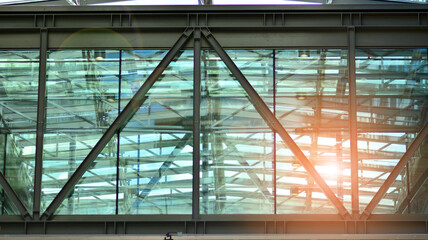 Fragment of glass and metal facade walls. Commercial office buildings. Abstract modern business architecture.