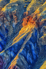 Fototapeta na wymiar multicolored mountains, geological texture background, multicolor deposits of minerals, landscape