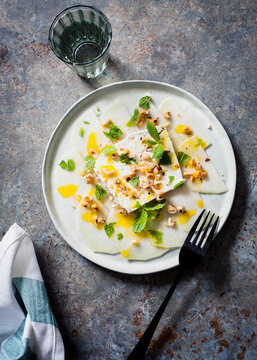 celeriac carpaccio with feta mint and hazelnuts