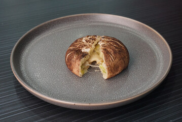 steamed fresh mushroom cheesy bun baozi in mushroom shape on dark grey wood background dim sum halal menu