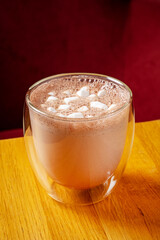 hot chocolate with marshmallow on table