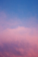 Pastel sunrise sky as background.