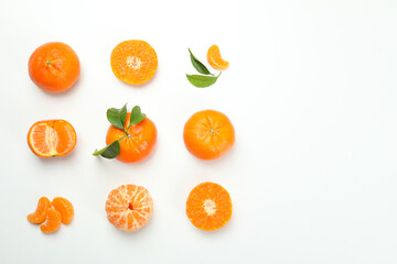 Flat lay with mandarins on white background