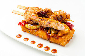 chicken kebab with vegetables on the white