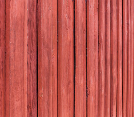 Schwedisches Haus. Rote Hausfassade aus Holz. Hintergrund. Background. Swedisch House. Old red color wooden facade..