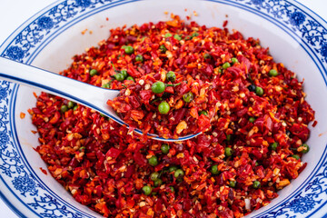 A bowl of spicy Litsea cubeba chili sauce