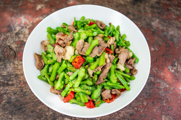 A dish of fried pork with concanavali beans in Hunan, China