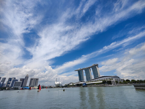 The dramatic cloud formation on a clear blue sky over the Marina Bay  -- Singapore 