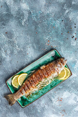 Grilled trout. Healthy eating concept. vertical image. top view. place for text