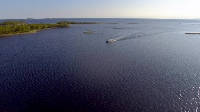 Solovki Russia the boat enters the bay aerial drone footage 4K