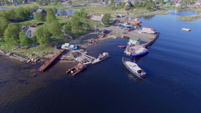  Solovki Russia the boat is approaching the pier aerial drone footage 4K