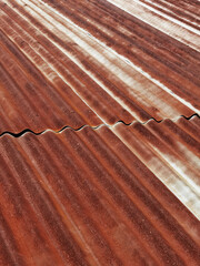 Old zinc surface background or the tin roof background with the rust