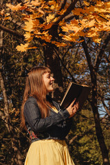 Girl in autumn park