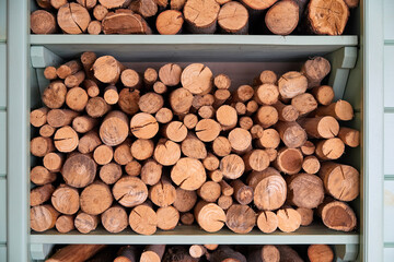 Background of firewoods in a woodshed