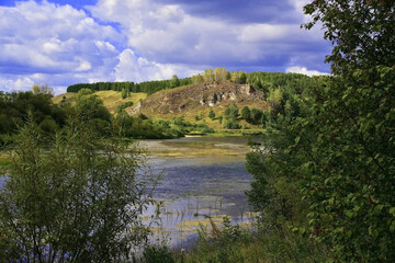 Fototapeta na wymiar Lobach stone on the right bank of the Sylva river valley in the Kishert district of the Perm region.