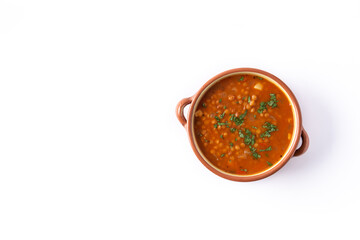 Red lentil soup in bowl isolated on white background.Top view. Copy space