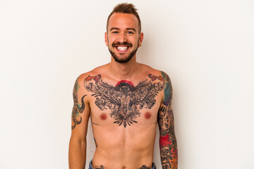 Fototapeta premium Young caucasian man without t-shirt isolated on white background happy, smiling and cheerful.