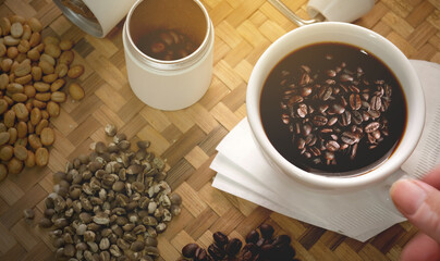 Soft focus coffee drip, organic brand. Hot coffee and smoke.