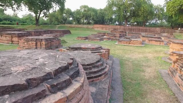 The Ancient Archaeological Buddhist Remains of Sarnath with the Mulagandha Kuti Pedestals made of Brick and Stone in Sarnath, Varanasi, India.