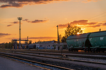 Obraz premium Railway Station In Sunset Lights