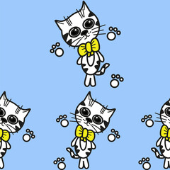 white cats with yellow bows