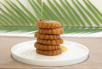 honey coated cookies on plate