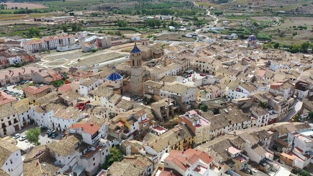 Scenic view from drone of ancient quarter of historic Spanish town of Requena overlooking typical architecture and narrow streets on sunny fall day, Valencia